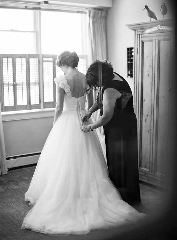 mom-helping-with-wedding-gown
